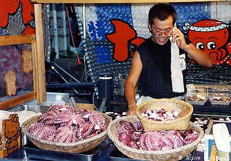 TakoYaki Man on Cellphone